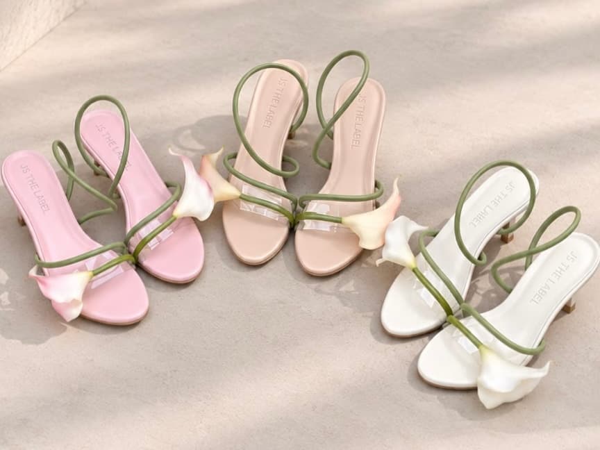 A pair of JSTheLabel heels, paused mid-step